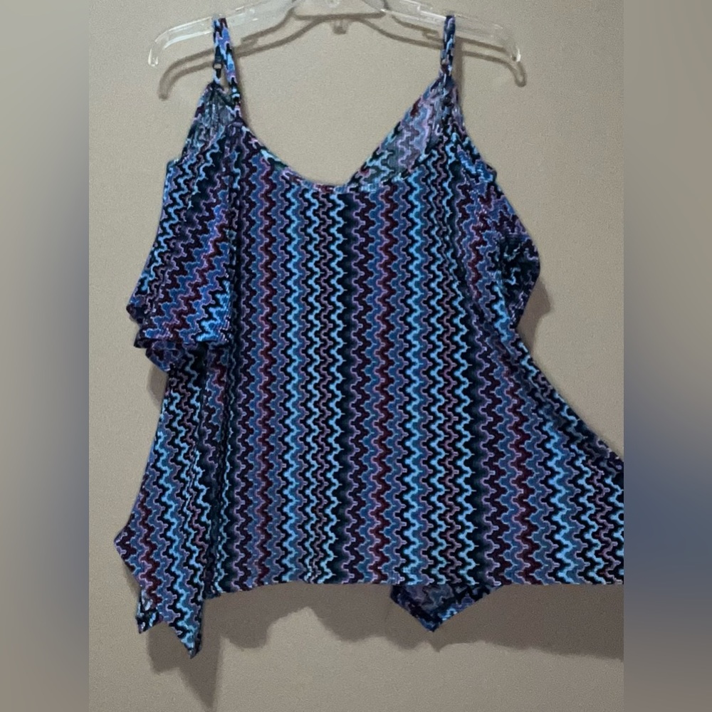 blouse with asymmetrical style and flutter off the shoulder sleeves